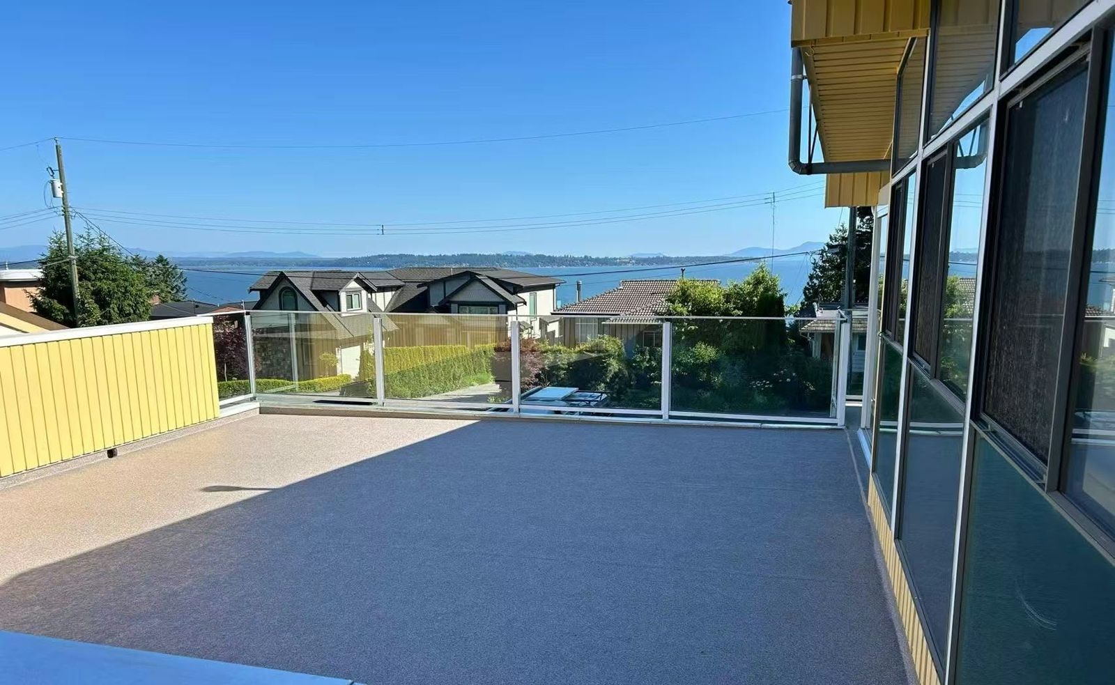 After: Old roof-deck surface to new vinyl, ocean view